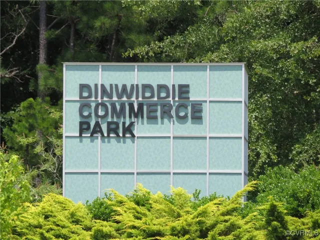 a view of a house with a fence