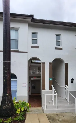 a front view of a house with outdoor space