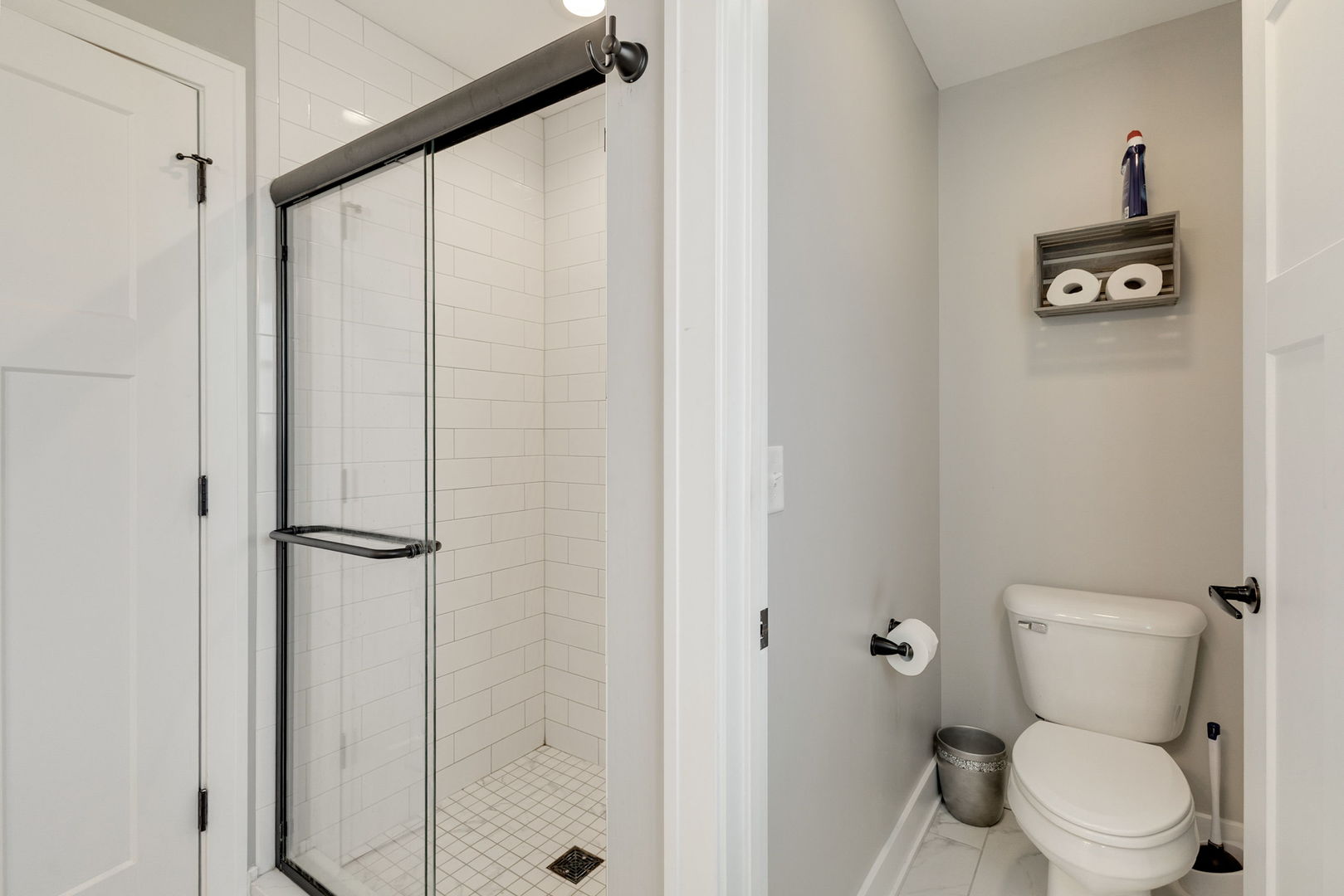 1059 Hummingbird Lane Peotone, IL 60468 - Photo 12 of 30 a white toilet sitting next to a shower