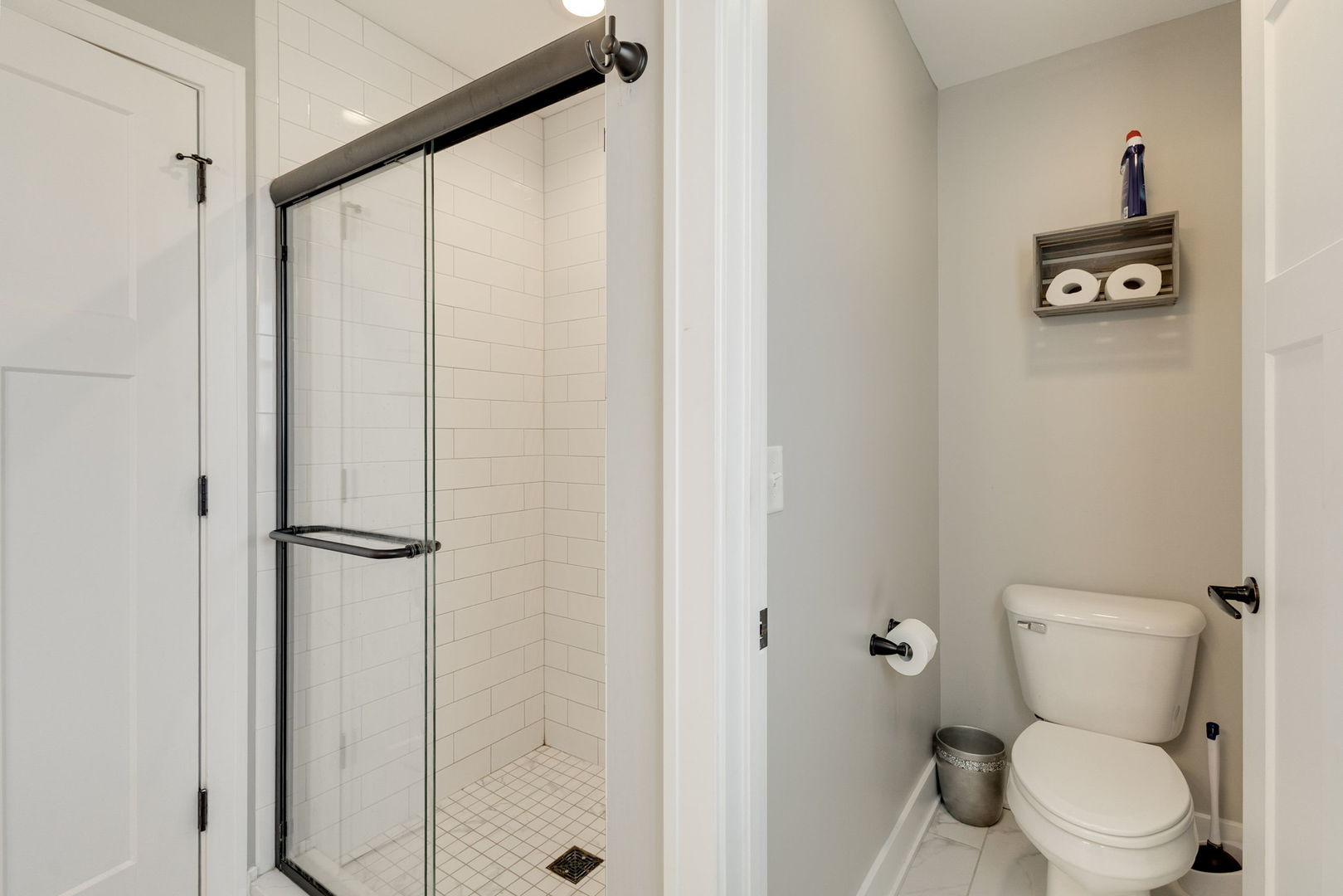 1059 Hummingbird Lane Peotone, IL 60468 - Photo 18 of 30 a white toilet sitting next to a shower