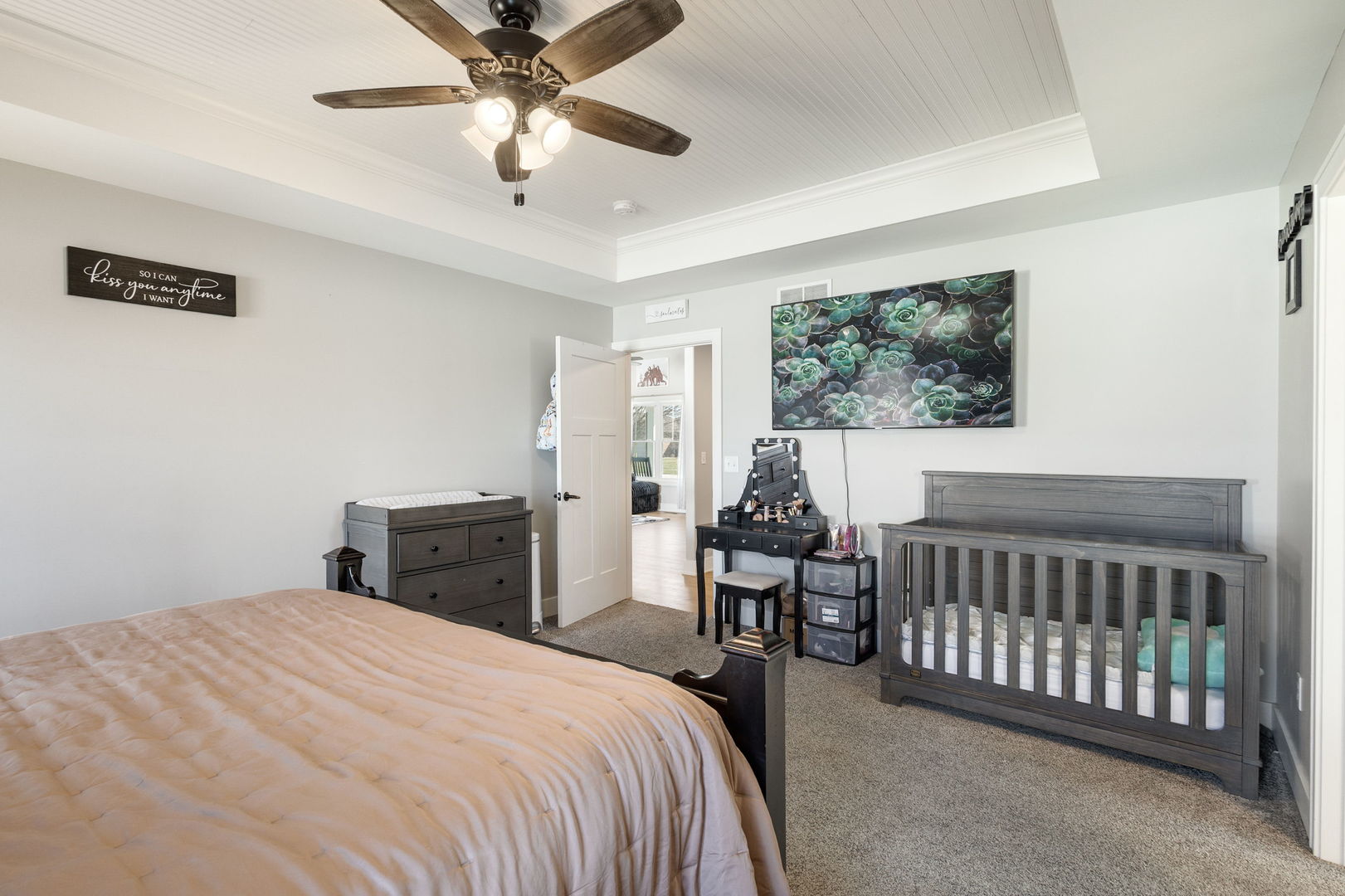 1059 Hummingbird Lane Peotone, IL 60468 - Photo 21 of 30 a bedroom with a bed and a chandelier