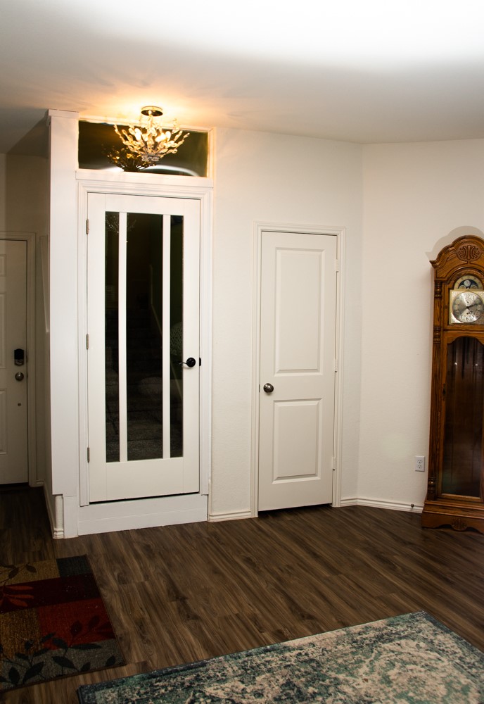 208 Greatest Gift Way Jarrell, TX 76537 - Photo 11 of 16 a view of a bedroom with wooden floor