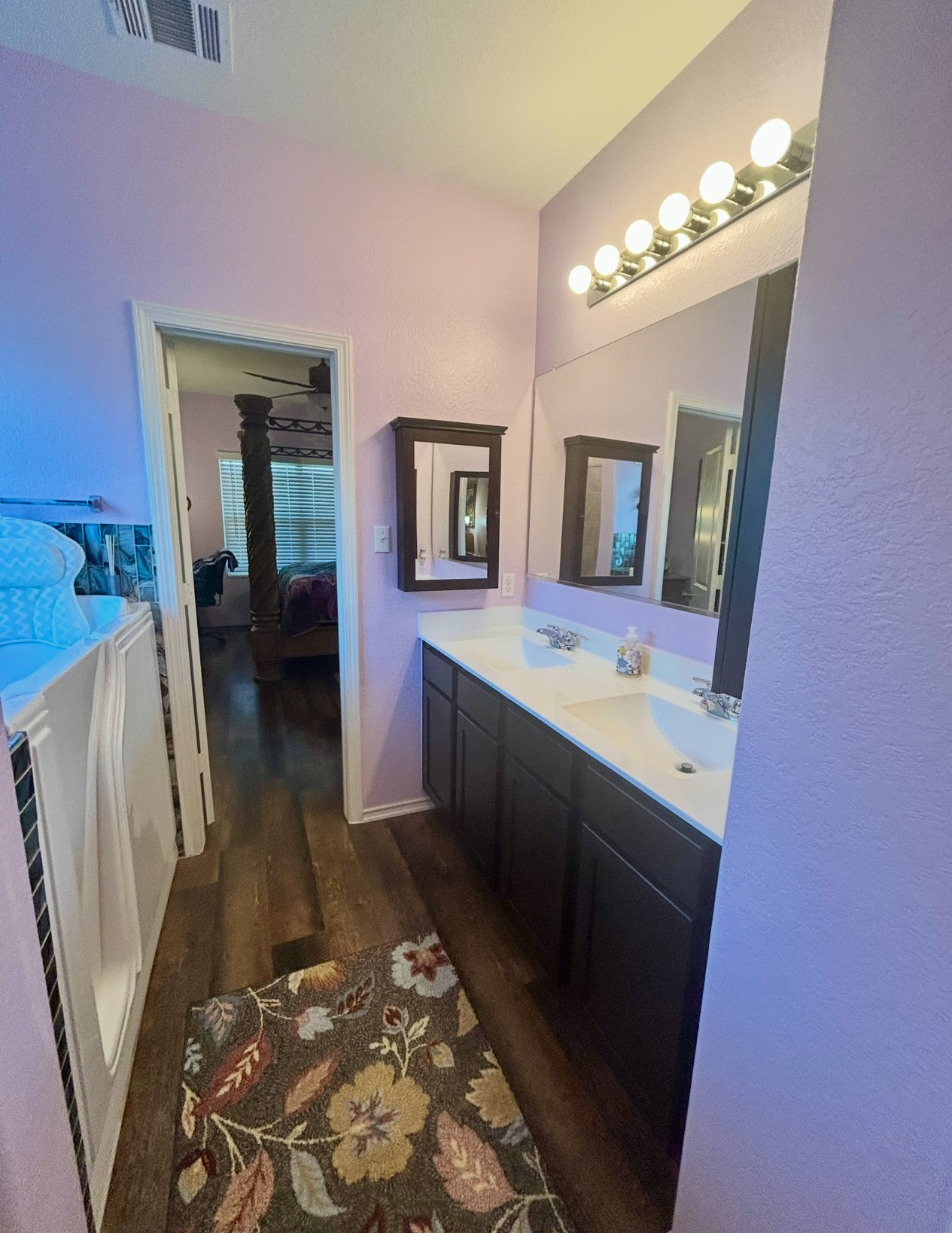 208 Greatest Gift Way Jarrell, TX 76537 - Photo 13 of 16 a bathroom with a sink a vanity and a mirror