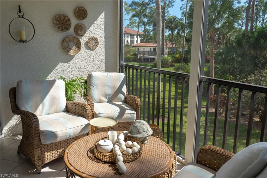 265 Deerwood Circle, Unit 10 Naples, FL 34113 - Photo 13 of 38 View of balcony