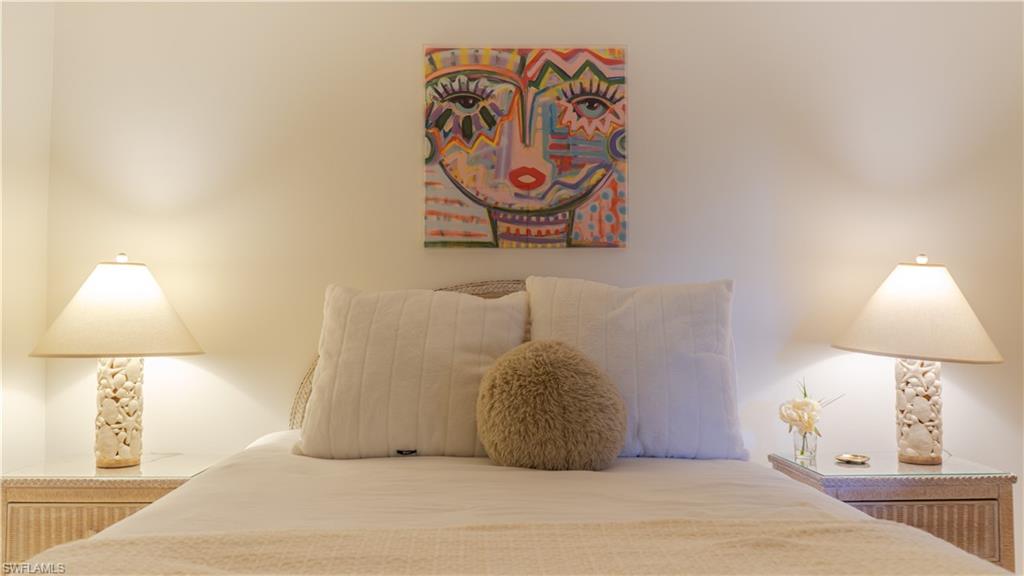 265 Deerwood Circle, Unit 10 Naples, FL 34113 - Photo 20 of 38 View of bedroom