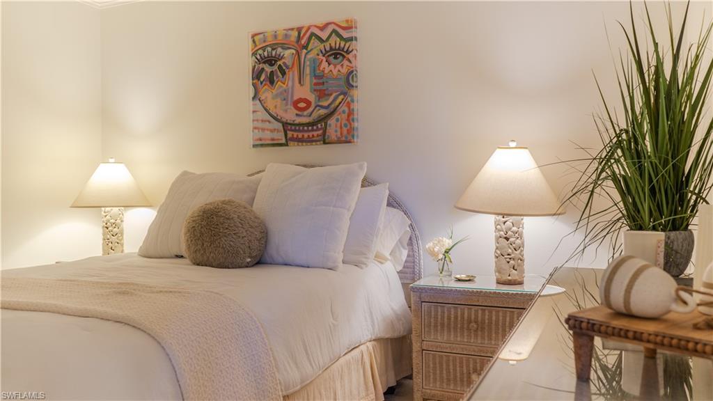 265 Deerwood Circle, Unit 10 Naples, FL 34113 - Photo 24 of 38 View of bedroom