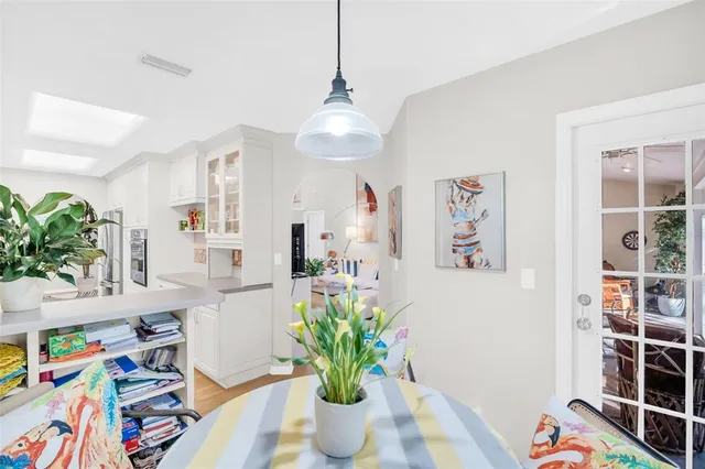 a bedroom with bed and a night stand