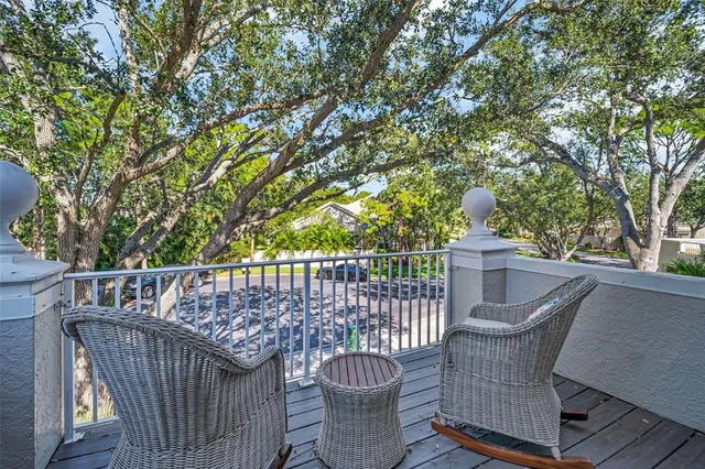an aerial view of residential houses with outdoor space and swimming pool