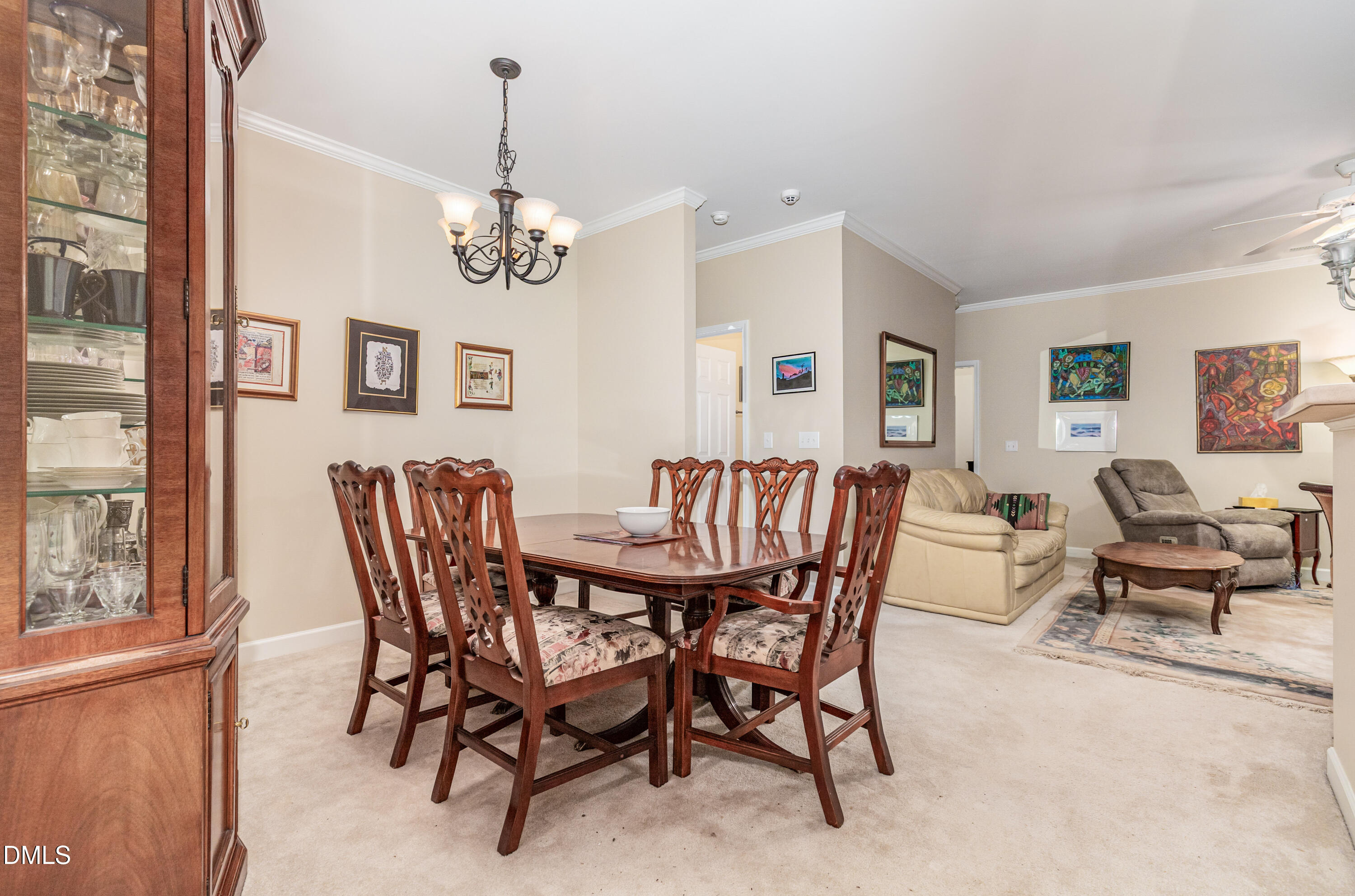 2541 Forest Shadows Lane Raleigh, NC 27614 - Photo 11 of 23 a view of a dining room with furniture window and wooden floor