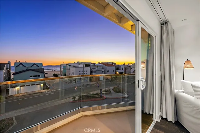 a view of a balcony with city view