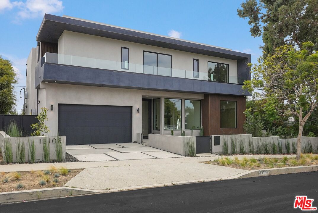 13108 Psomas Way Los Angeles, CA 90066 - Photo 1 of 1 a front view of a house with a yard