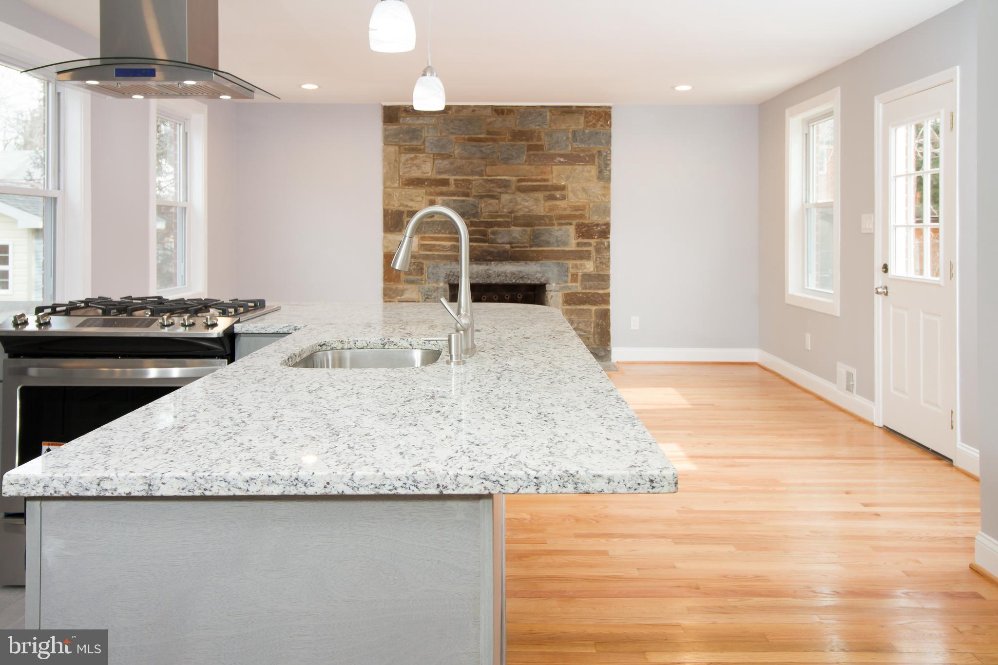 11437 Schuylkill Road Rockville, MD 20852 - Photo 11 of 43 Kitchen, fireplace and Family Room Addition