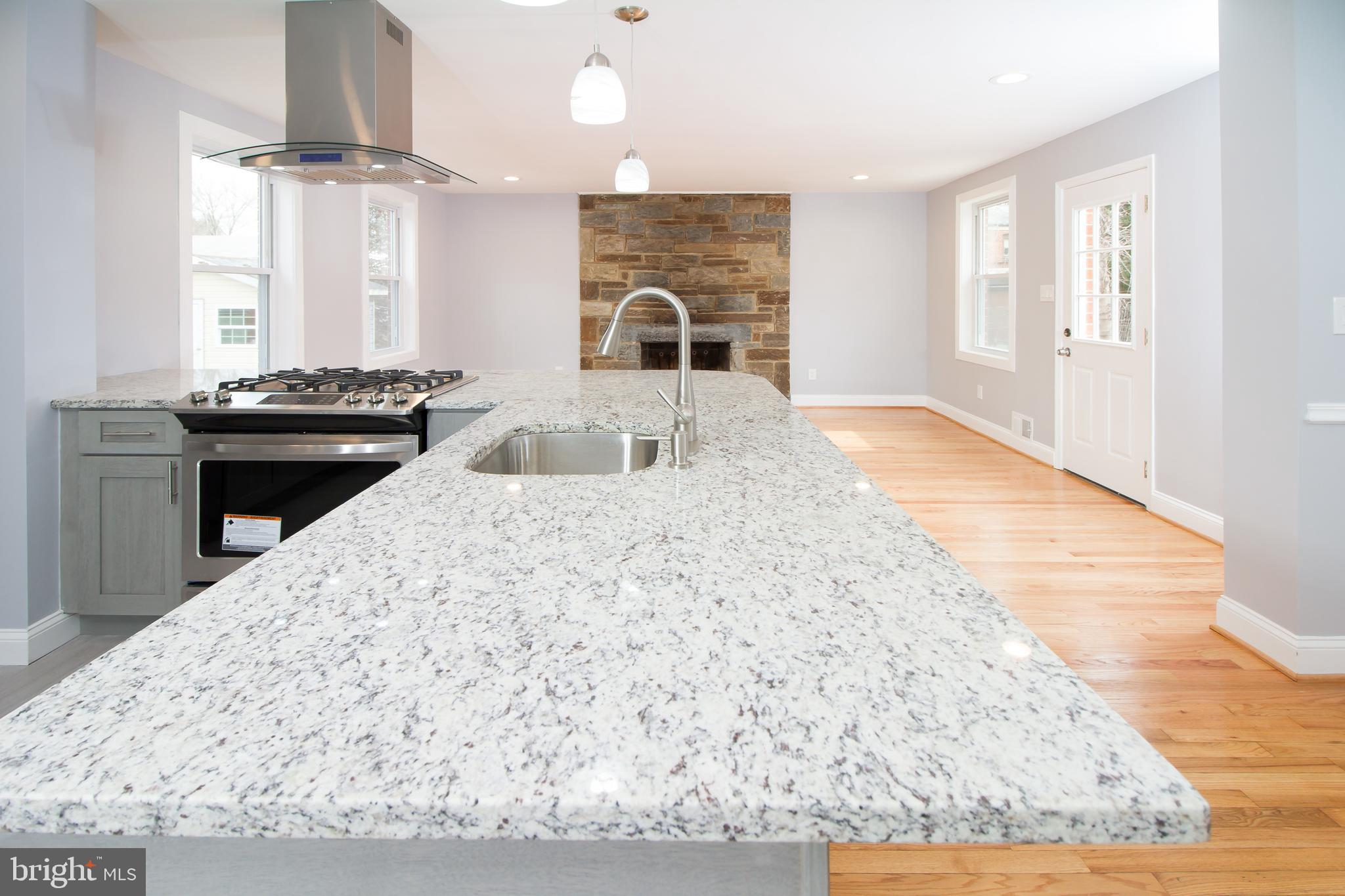 11437 Schuylkill Road Rockville, MD 20852 - Photo 12 of 43 Kitchen, fireplace and Family Room Addition