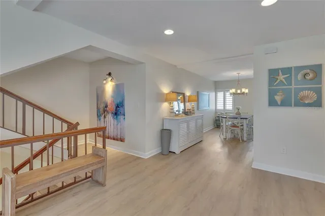 a view of a living room and dining room