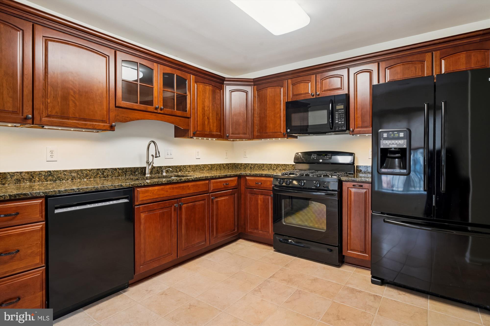524 Coover Road Annapolis, MD 21401 - Photo 17 of 67 a kitchen with stainless steel appliances granite countertop a refrigerator stove and sink