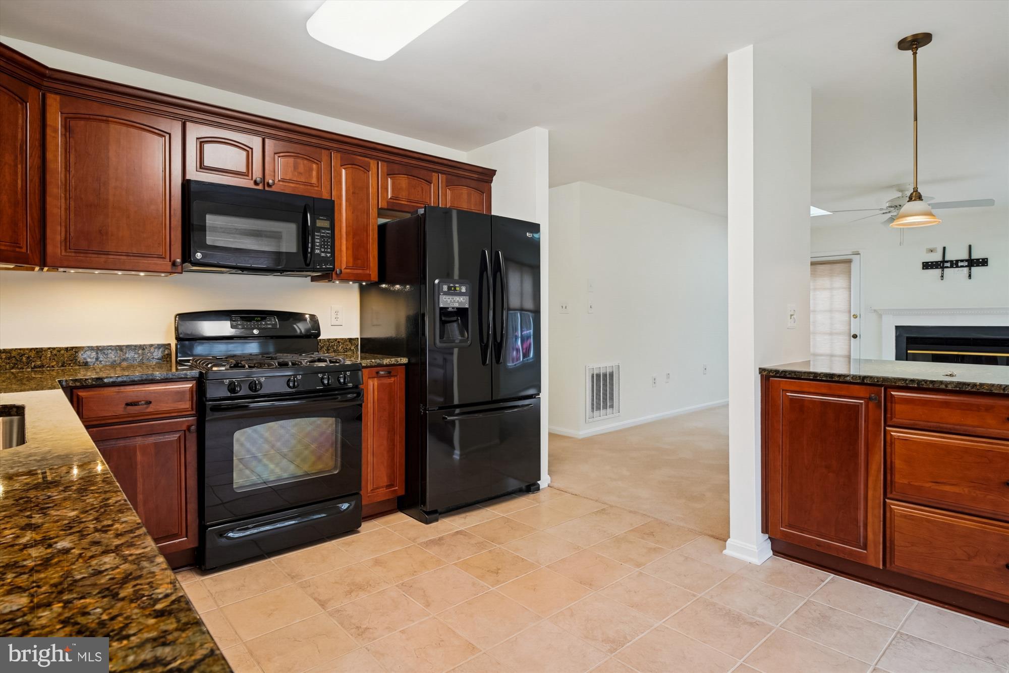 524 Coover Road Annapolis, MD 21401 - Photo 19 of 67 a kitchen with stainless steel appliances granite countertop a refrigerator stove and sink