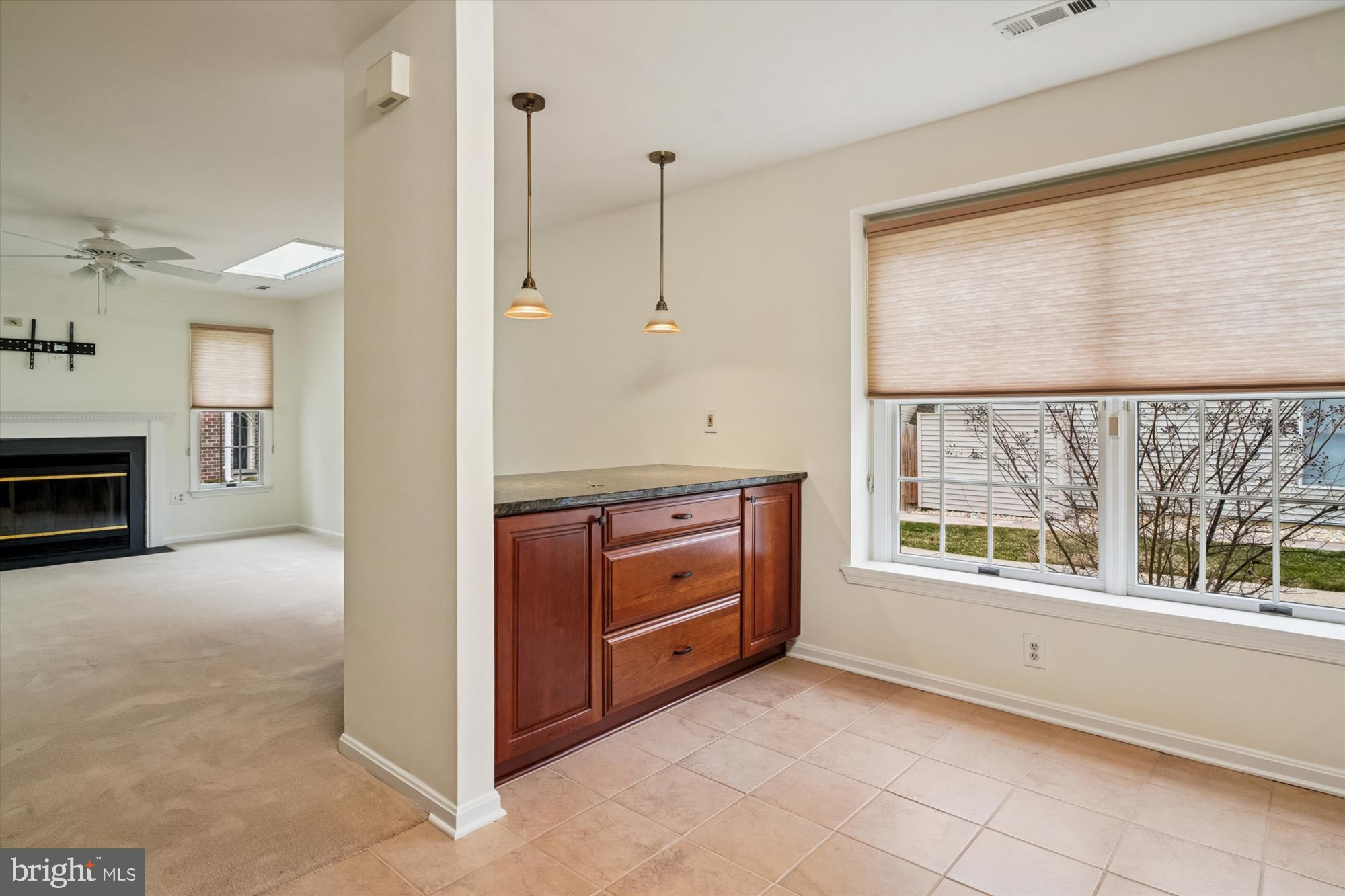 524 Coover Road Annapolis, MD 21401 - Photo 21 of 67 a view of an empty room with a fireplace and a window
