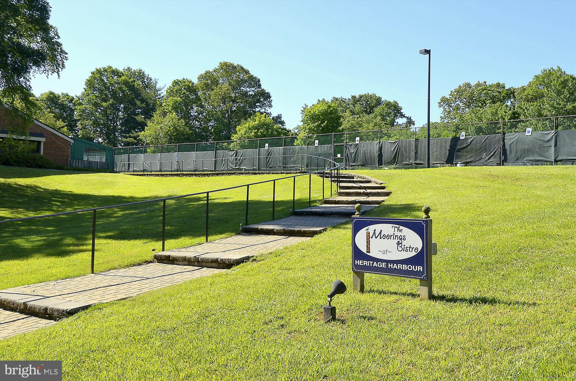 524 Coover Road Annapolis, MD 21401 - Photo 59 of 67 a view of a swimming pool with a yard and furniture