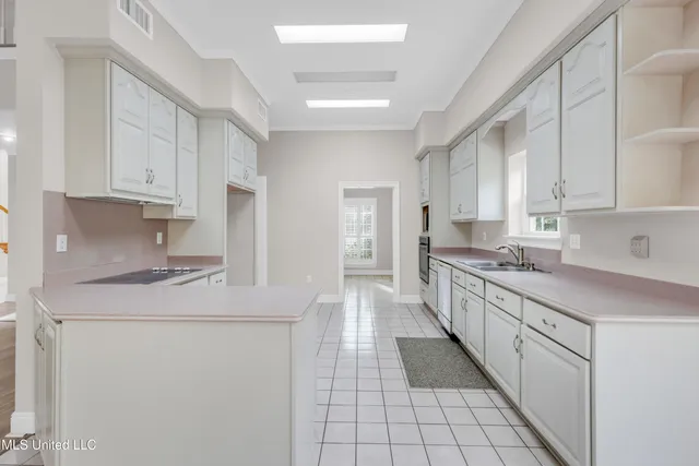 $430,000 | 79293 Diamondhead Drive East, Diamondhead, MS 39525