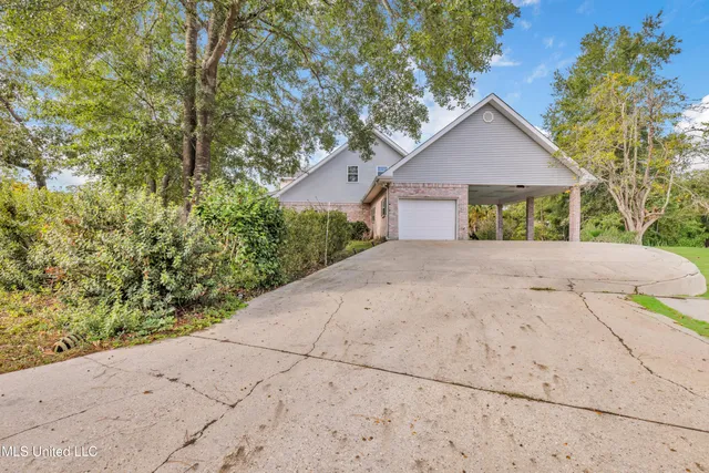 $430,000 | 79293 Diamondhead Drive East, Diamondhead, MS 39525