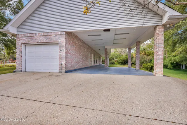 $430,000 | 79293 Diamondhead Drive East, Diamondhead, MS 39525