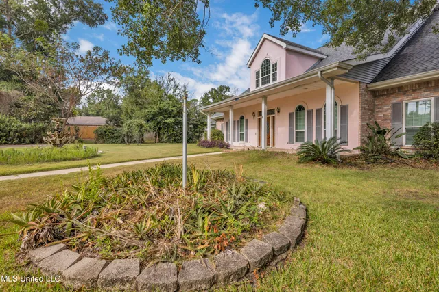 $430,000 | 79293 Diamondhead Drive East, Diamondhead, MS 39525