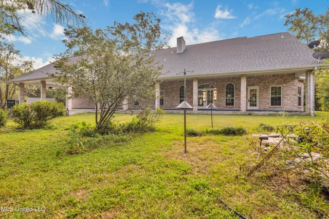 $430,000 | 79293 Diamondhead Drive East, Diamondhead, MS 39525