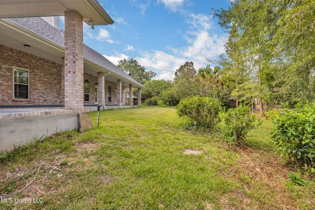 $430,000 | 79293 Diamondhead Drive East, Diamondhead, MS 39525