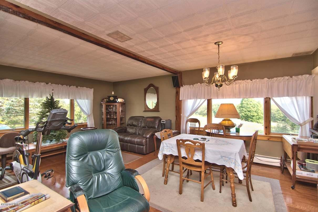 2370 Wrighter Lake Road Thompson, PA 18465 - Photo 13 of 106 Dining Room/ Living Room