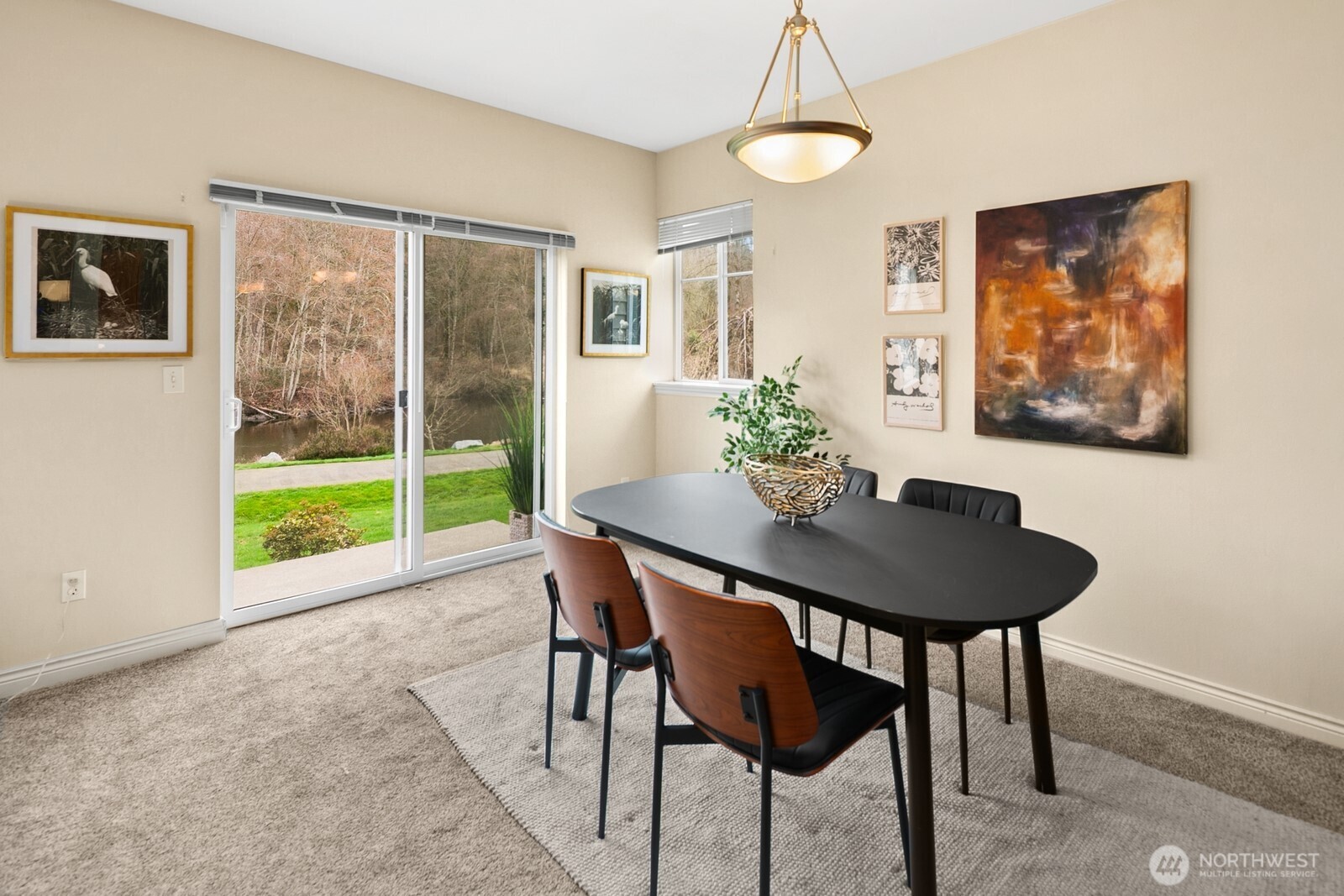 17432 Bothell Way Northeast, Unit B108 Bothell, WA 98011 - Photo 17 of 40 a view of a dining room with furniture window and wooden floor