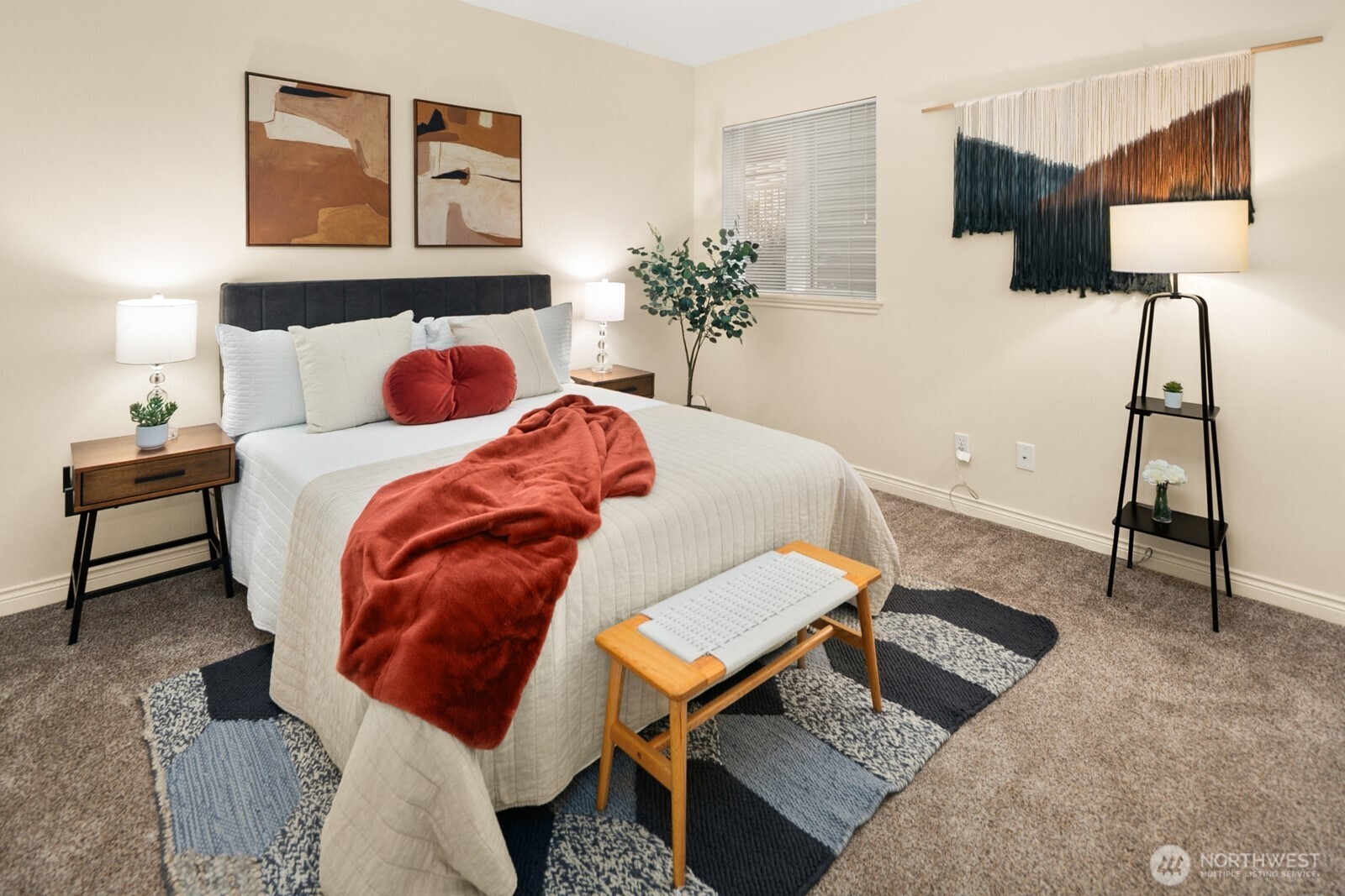 17432 Bothell Way Northeast, Unit B108 Bothell, WA 98011 - Photo 25 of 40 a bed room with a bed a lamp and a lamp