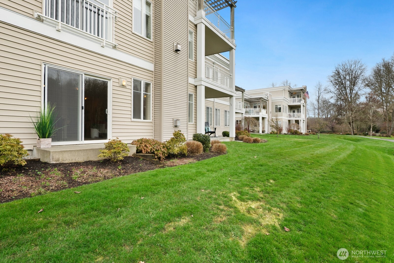 17432 Bothell Way Northeast, Unit B108 Bothell, WA 98011 - Photo 31 of 40 a view of a house with a backyard