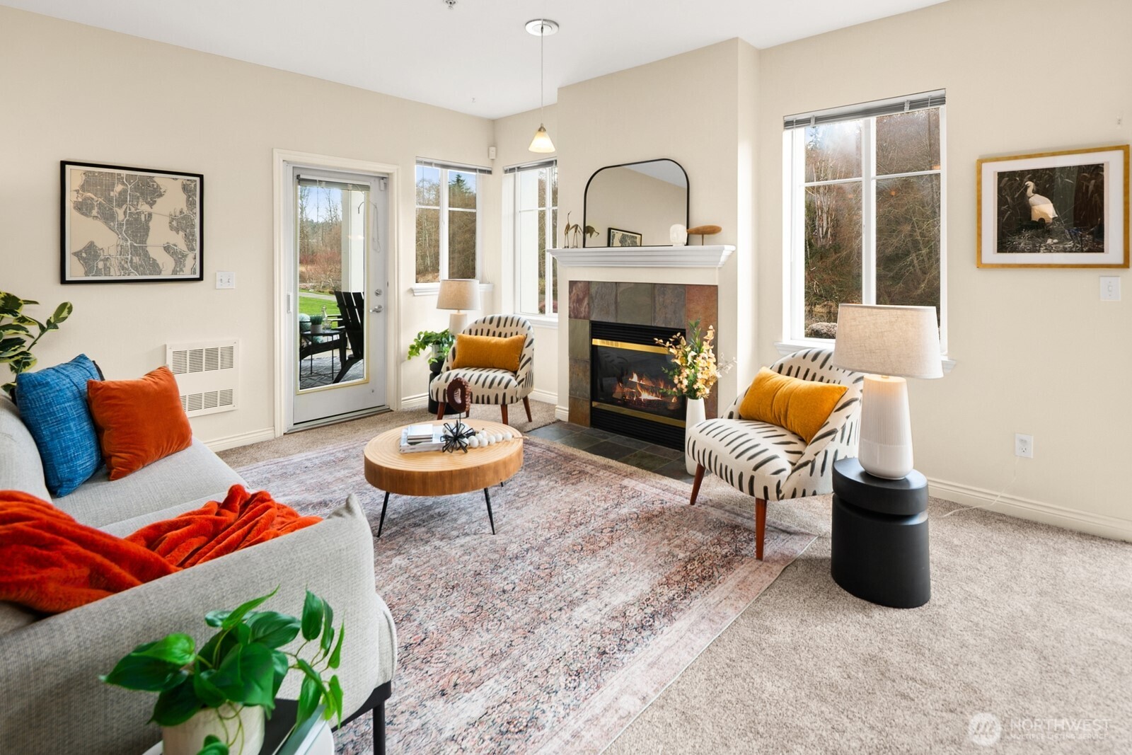 17432 Bothell Way Northeast, Unit B108 Bothell, WA 98011 - Photo 6 of 40 a living room with furniture and a fireplace