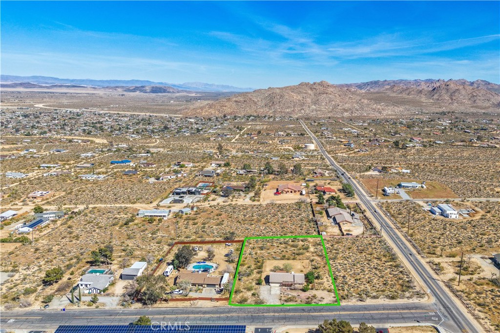 7273 Sunny Vista Road Joshua Tree, CA 92252 - Photo 33 of 36 an aerial view of residential houses with outdoor space