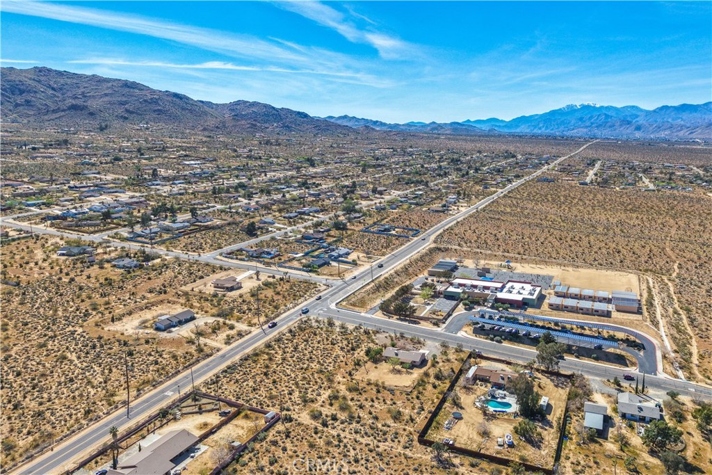 7273 Sunny Vista Road Joshua Tree, CA 92252 - Photo 36 of 36 an aerial view of residential houses with outdoor space