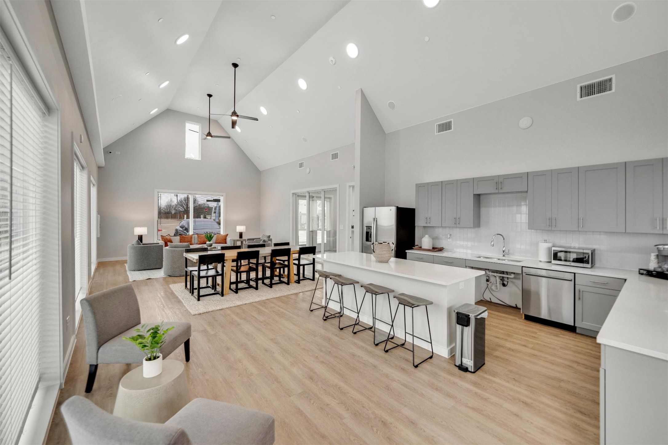 2410 Eaton Street Fort Worth, TX 76108 - Photo 23 of 33 a large white kitchen with lots of counter space and stainless steel appliances