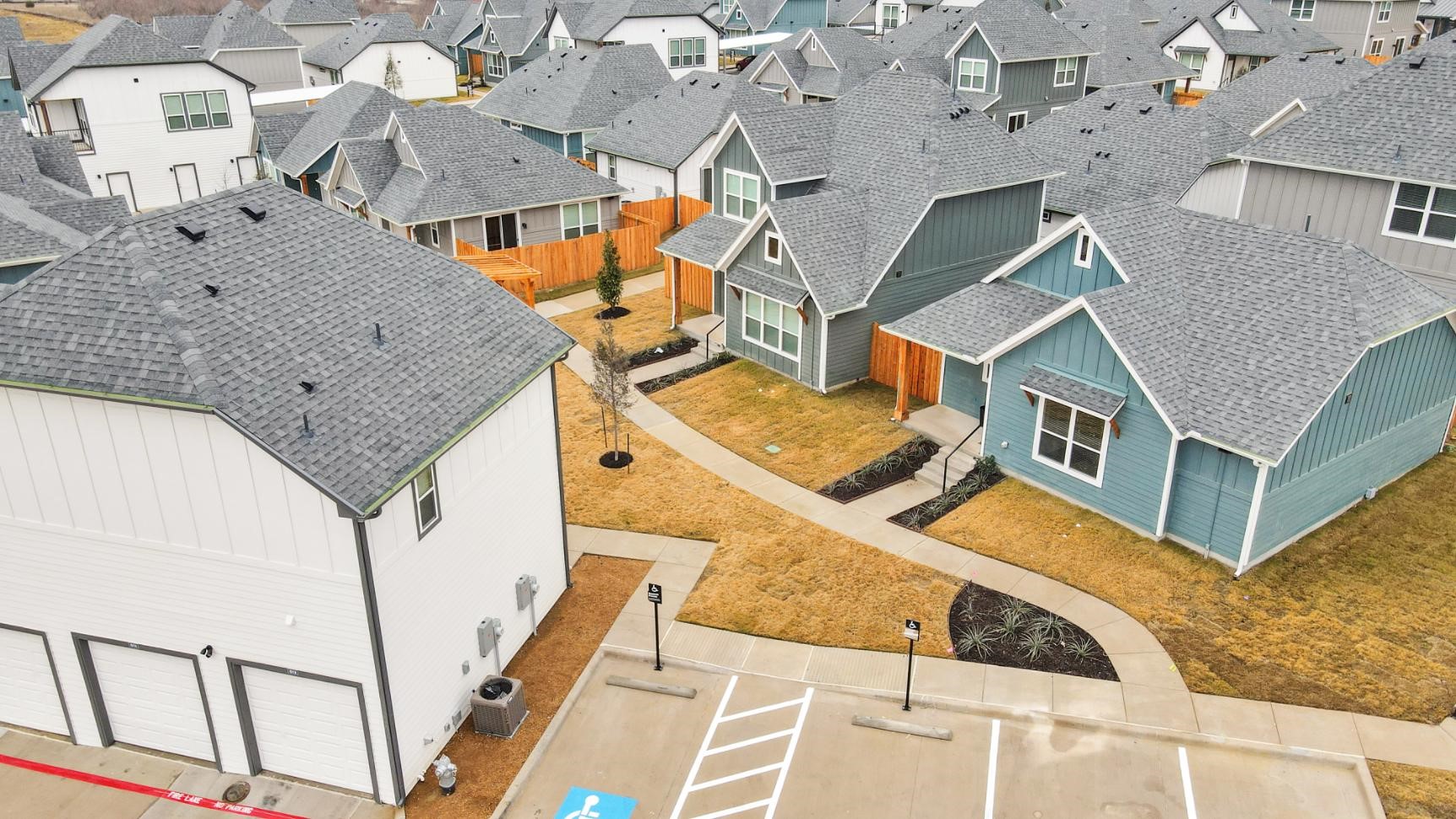 2410 Eaton Street Fort Worth, TX 76108 - Photo 30 of 33 an aerial view of a house with roof deck