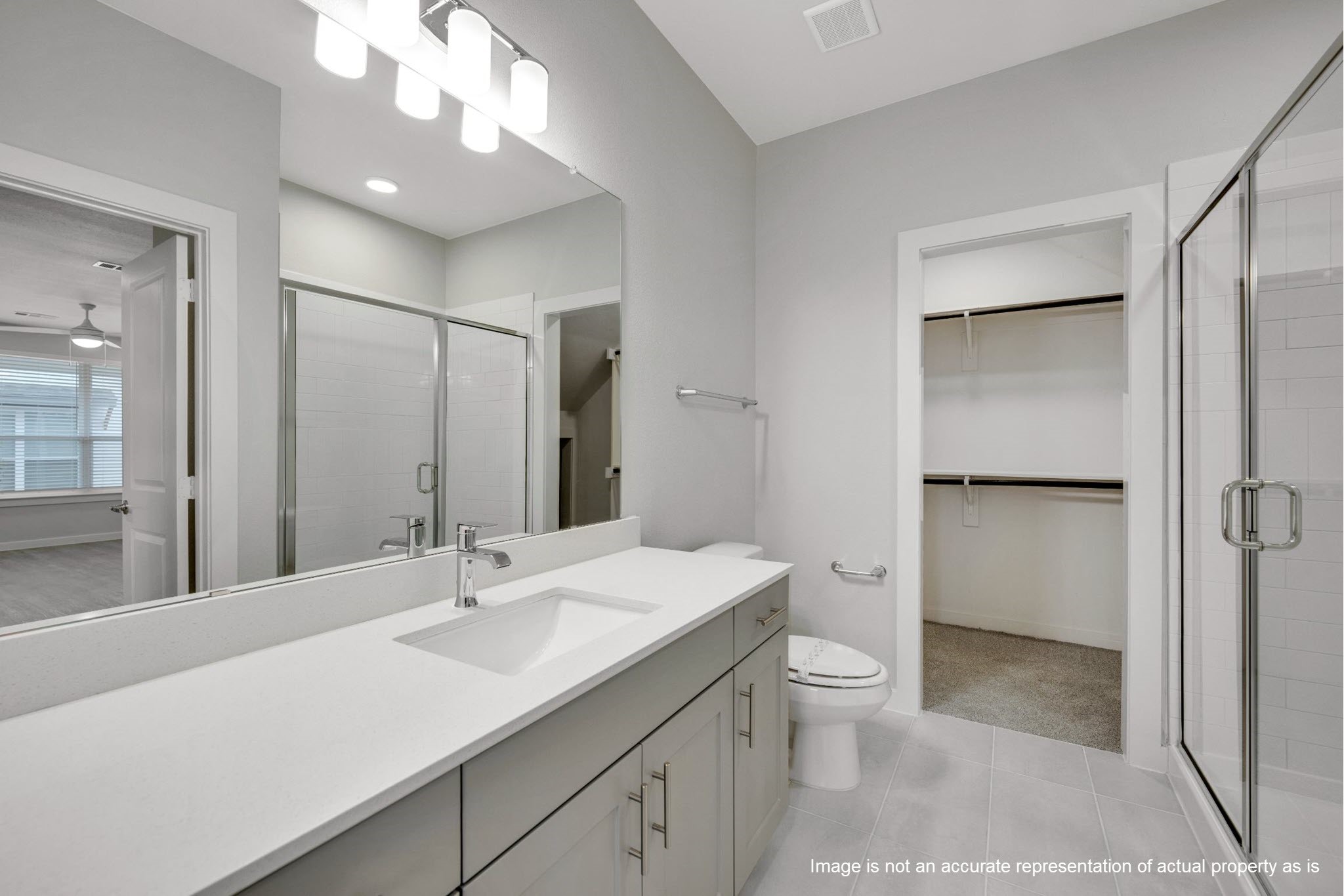 2410 Eaton Street Fort Worth, TX 76108 - Photo 7 of 33 a bathroom with a sink a toilet and shower