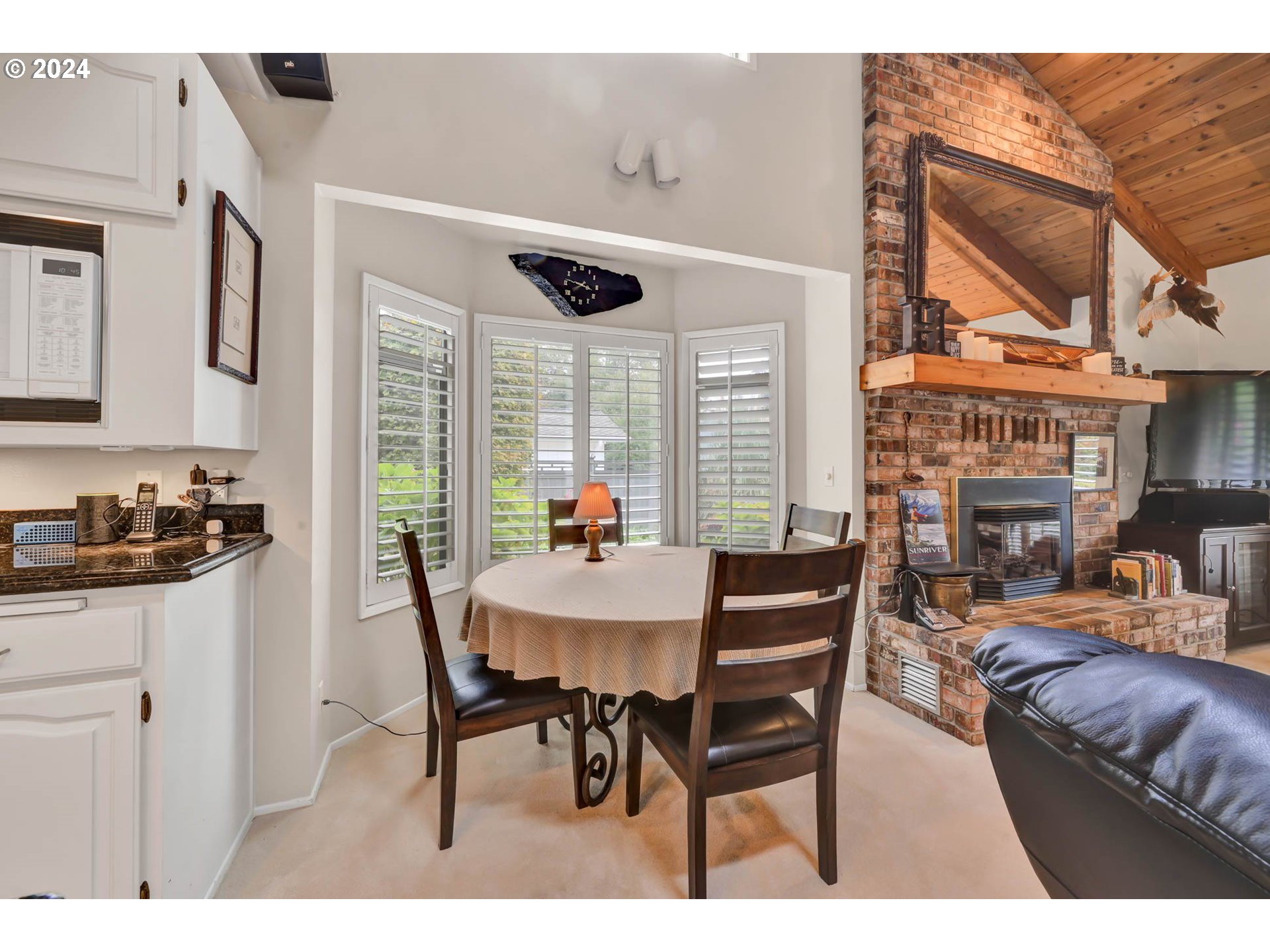 2122 Brookhaven Way Eugene, OR 97401 - Photo 11 of 48 a view of a dining room with furniture and a large window