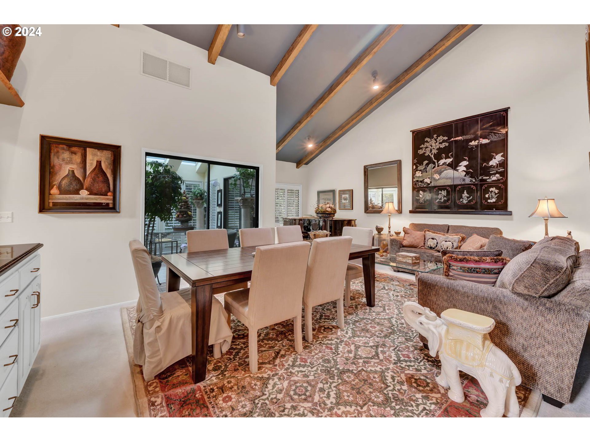 2122 Brookhaven Way Eugene, OR 97401 - Photo 16 of 48 a living room with furniture a table and a large window
