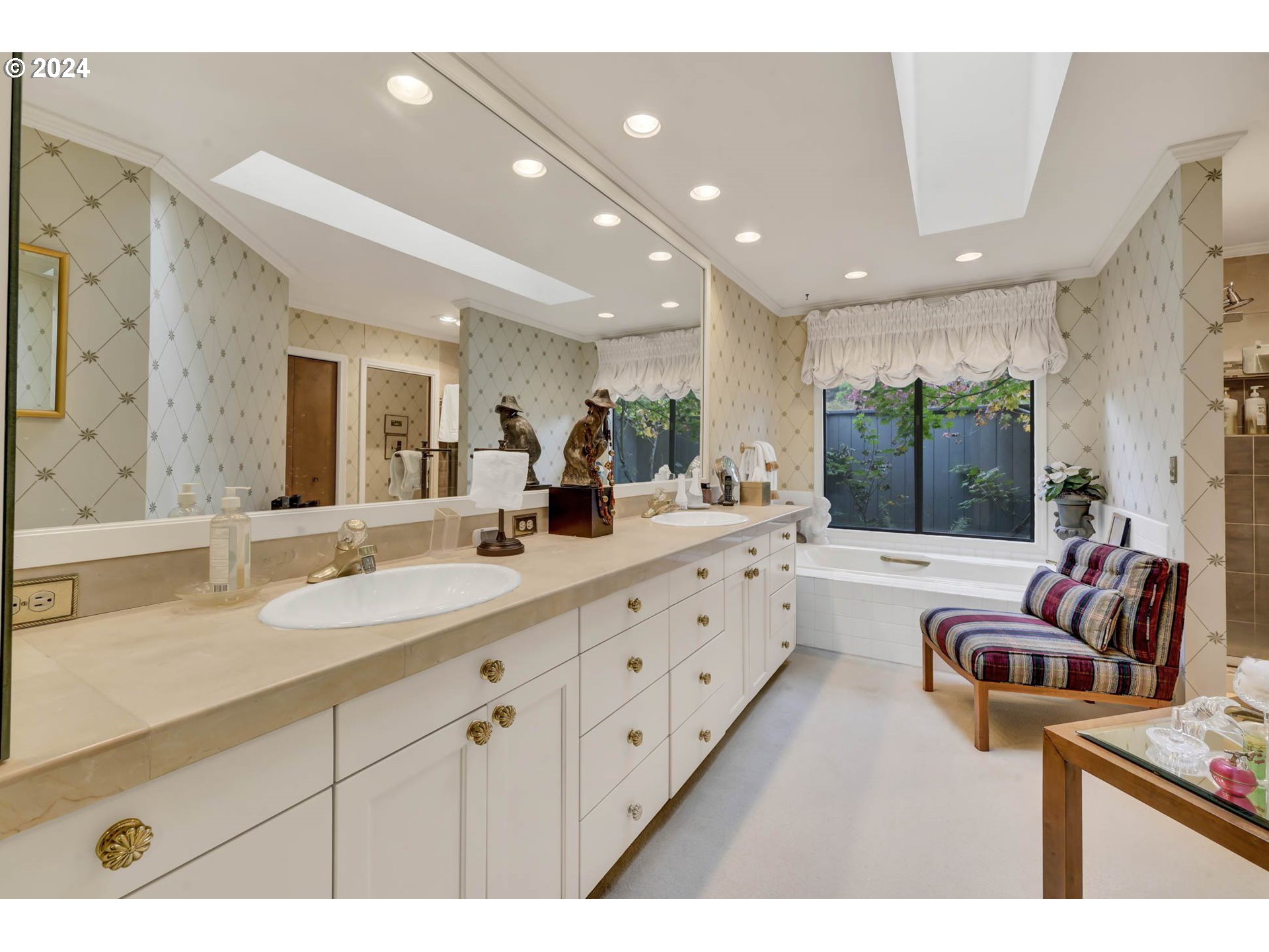 2122 Brookhaven Way Eugene, OR 97401 - Photo 25 of 48 a large living room with stainless steel appliances furniture a chandelier a sink and a large window