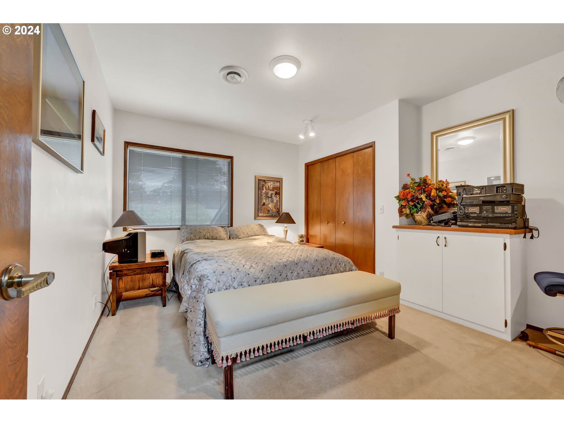 2122 Brookhaven Way Eugene, OR 97401 - Photo 29 of 48 a bedroom with a bed and large mirror