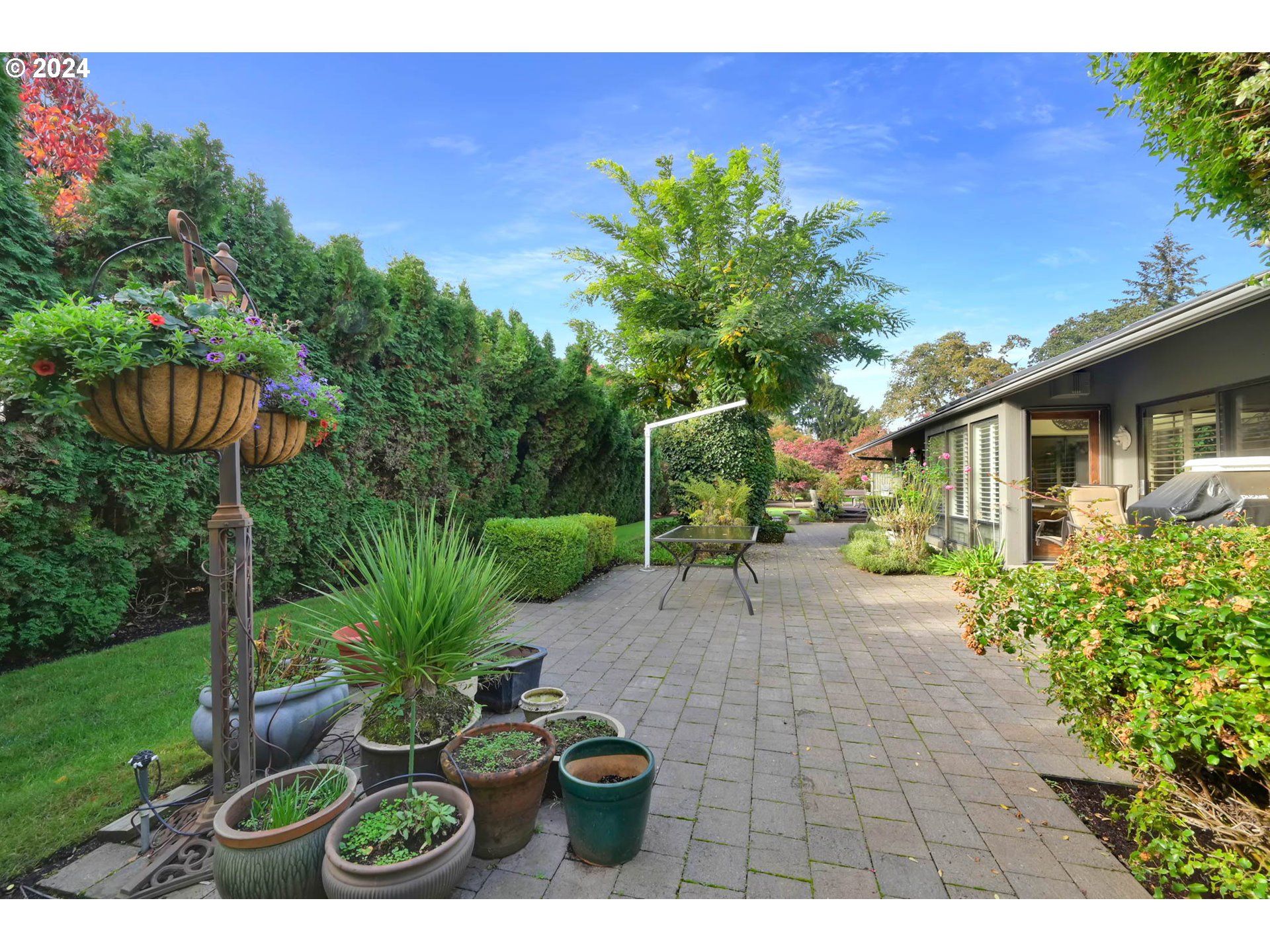 2122 Brookhaven Way Eugene, OR 97401 - Photo 38 of 48 a view of a backyard with plants and a patio