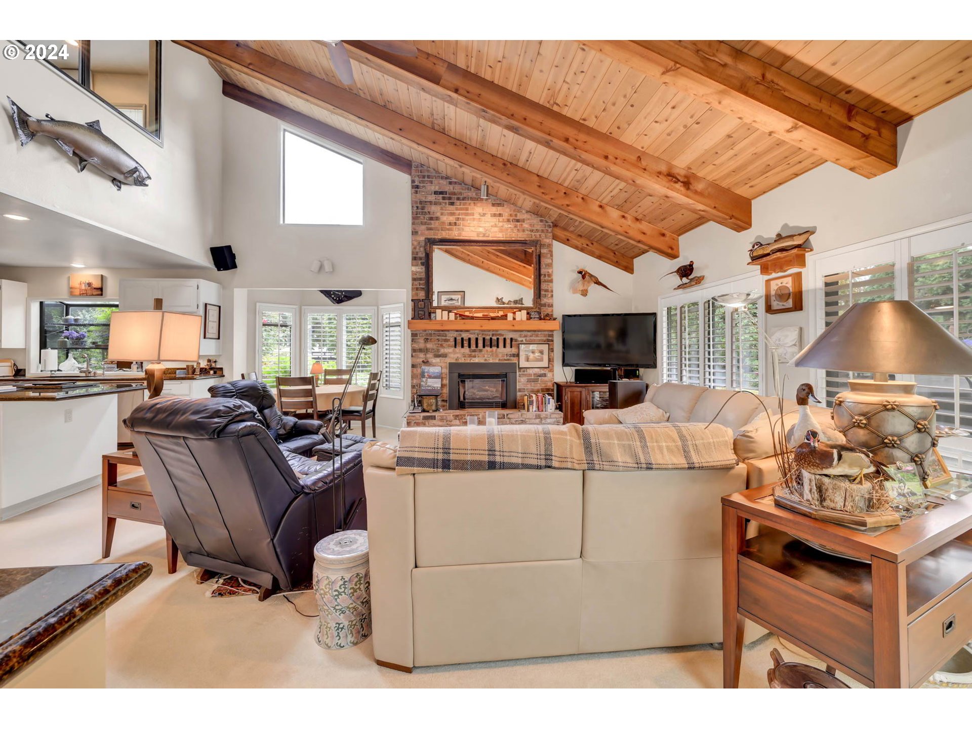 2122 Brookhaven Way Eugene, OR 97401 - Photo 6 of 48 a living room with furniture a flat screen tv and a table