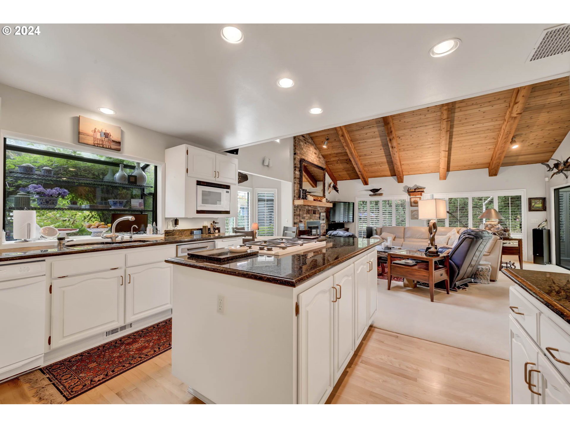 2122 Brookhaven Way Eugene, OR 97401 - Photo 8 of 48 a kitchen with stainless steel appliances granite countertop a sink and cabinets