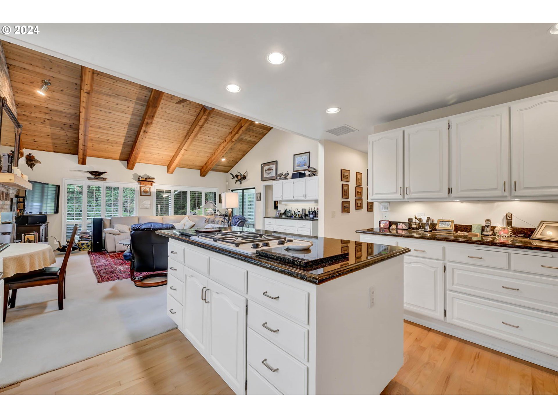 2122 Brookhaven Way Eugene, OR 97401 - Photo 10 of 48 a kitchen with stainless steel appliances granite countertop a sink and cabinets