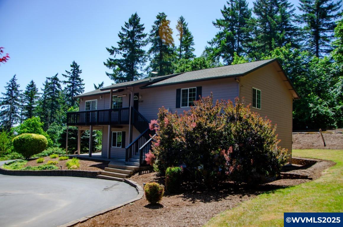 16870 Selden Road Dallas, OR 97338 - Photo 25 of 42 a view front of house with yard and green space