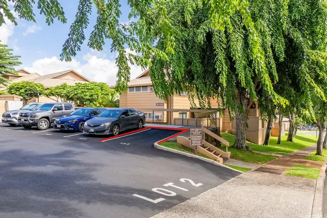 a view of a street with cars