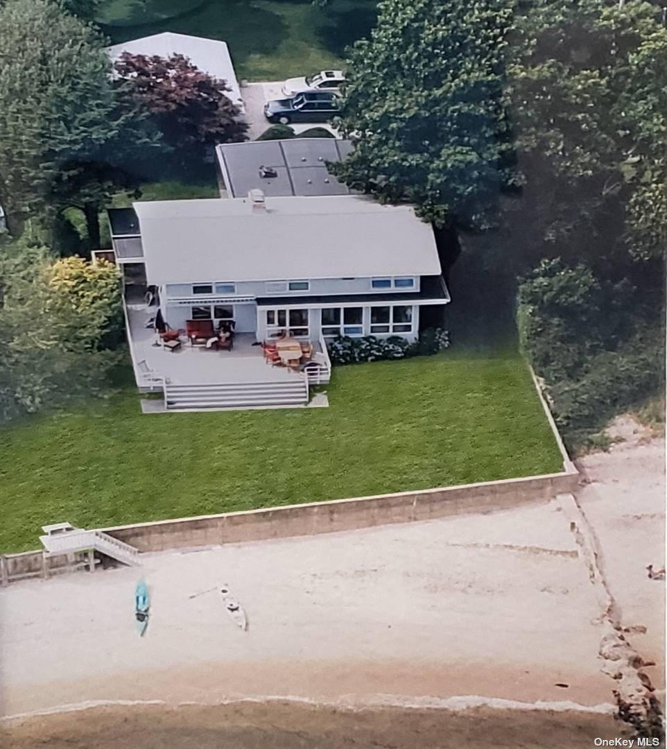11 Beach Road Riverhead, NY 11947 - Photo 32 of 34 an aerial view of a house with a yard basket ball court and outdoor seating