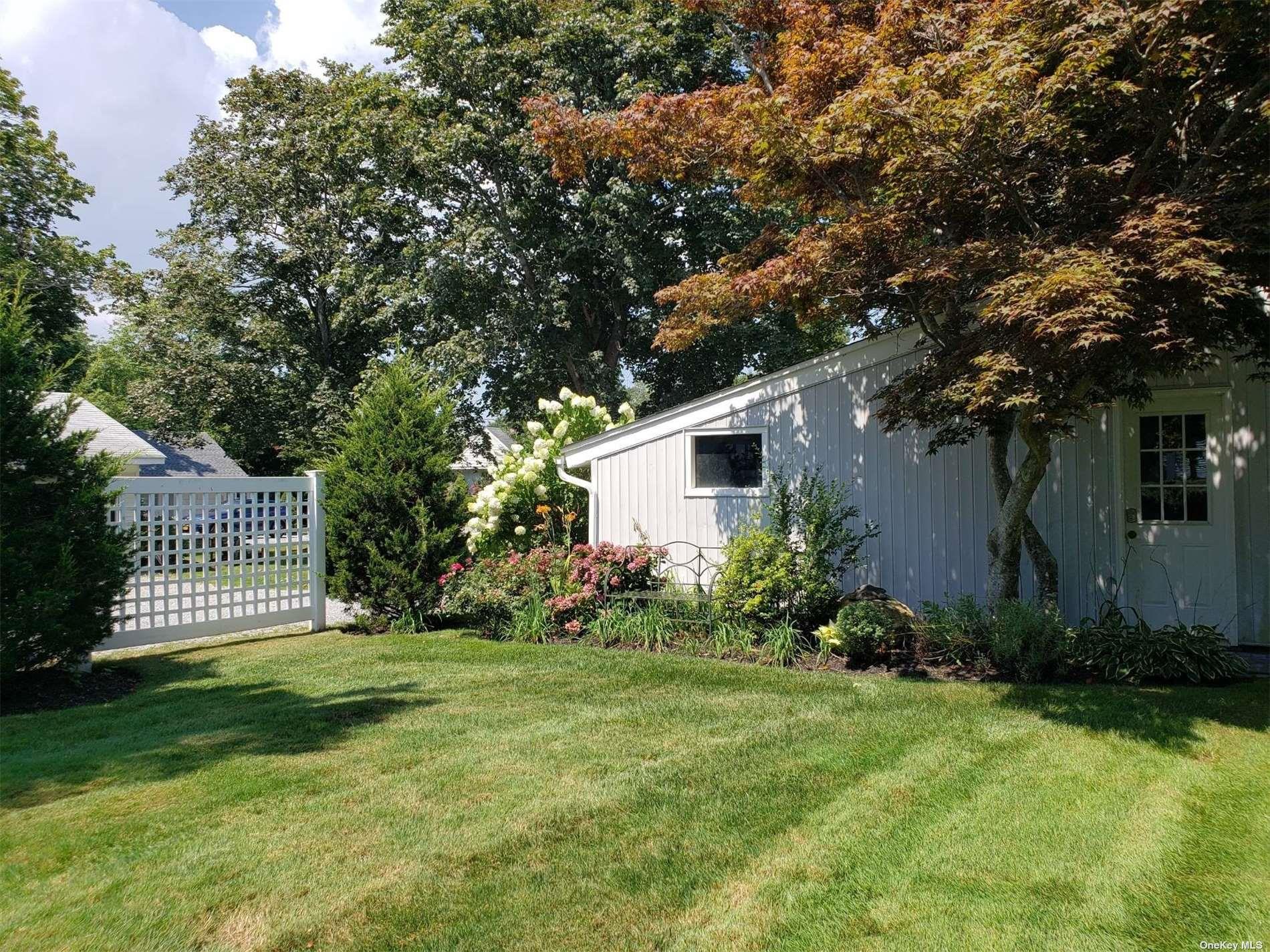 11 Beach Road Riverhead, NY 11947 - Photo 33 of 34 a front view of a house with garden